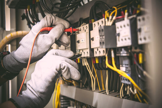 Electrician testing electrical panel Pasadena